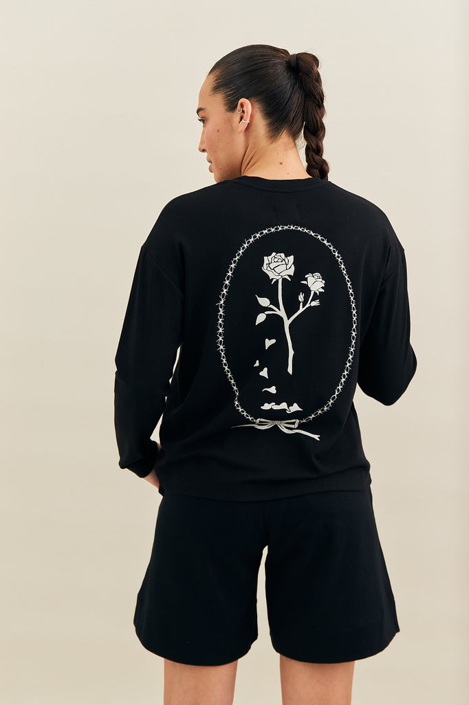 long sleeve t shirt with a rose and wire print on the back by noonstudio