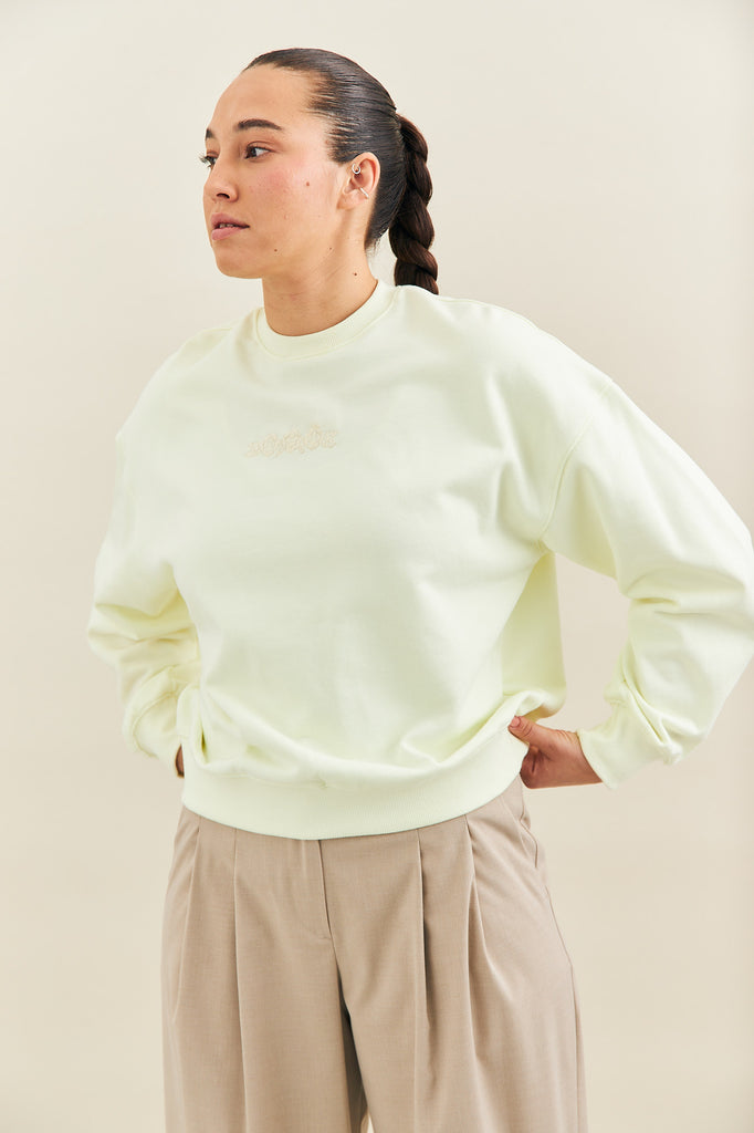 a french terry sweatshirt with front rose embroidery
