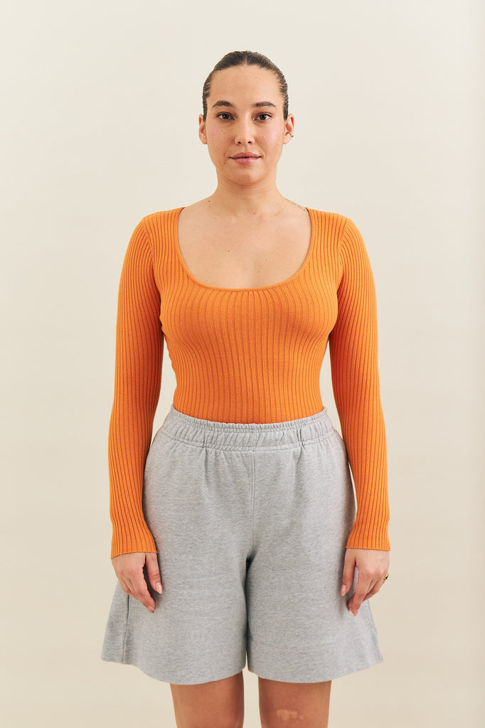 rib knit long sleeve orange body suit made by noon