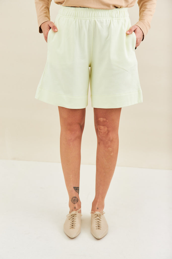 french terry knee length shorts in lime by noon