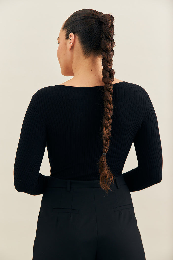 rib knit long sleeve orange body suit made by noon